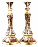 Lot 112 - A pair of Caverswall Romany candlesticks