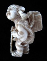 Lot 157 - Late 19th century Japanese ivory Netsuke, boy with basket and staff