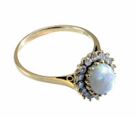 Lot 200 - Opal and diamond oval cluster 18ct gold ring, central opal approx 9mm x 7mm, the oval cluster surround comprising a total of 16 small round 8 cut diam
