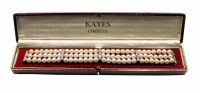 Lot 206 - A diamond set white gold 3-row cultured pearl bracelet, a total of 84 round silver white cultured pearls, approx. 6mm diameter average each, 18ct whit