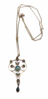 Lot 224 - An Edwardian 9ct gold aquamarine and seed pearl