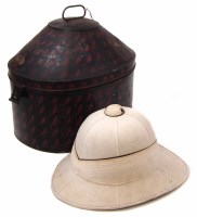 Lot 8 - Naval Pith helmet with a carrying tin case by
