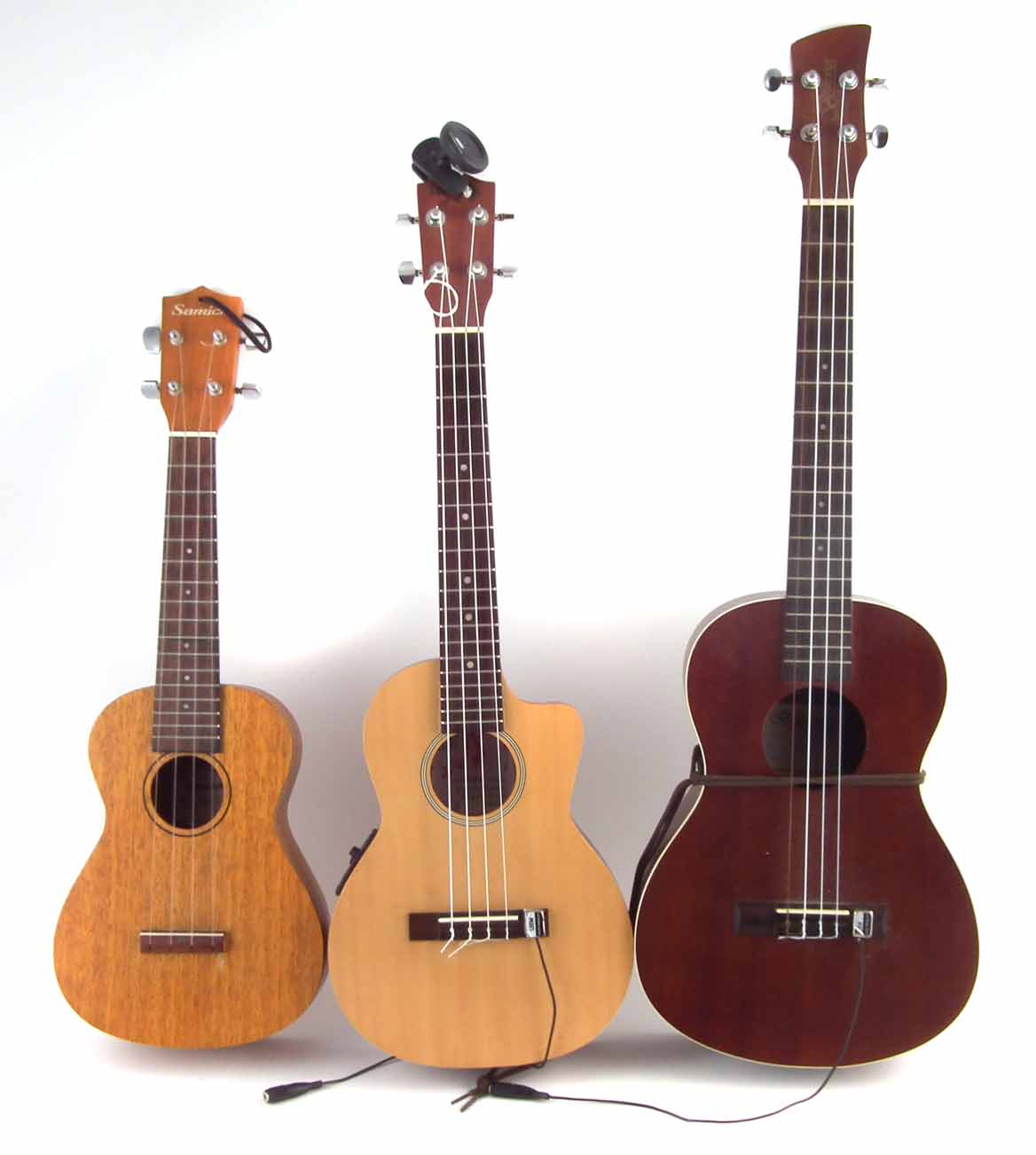 Lot 61 Three Ukuleles