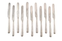 Lot 21 - 12 pairs of silver knives and forks, Marks "HH", Sheffield (filled)