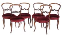 Lot 385 - Set of six Victorian rosewood balloon-back single dining chairs.