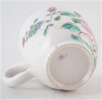Lot 84 - Bow good coffee cup painted in famille rose style with chrysanthemum and holed rocks c. 1755.