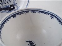 Lot 144 - Lowestoft tea-bowl and saucer painted with a rare under-glaze blue pattern c.1775.