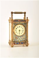Lot 336 - A late 19th century French champleve carriage clock