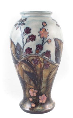 Lot 202 - Moorcroft vase, decorated with brambles pattern after Sally Tuffin, impressed and painted marks and silver 2nd line to base, 25cm high