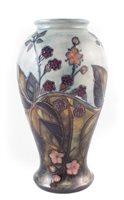 Lot 202 - Moorcroft vase, decorated with brambles pattern after Sally Tuffin, impressed and painted marks and silver 2nd line to base, 25cm high