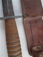 Lot 169 - A commando knife and a machete