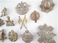 Lot 99 - A collection of cap badges