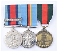 Lot 32 - A World War Two group of six medals awarded to 5124597 RQMS Warrant Officer Robert Gerald Brown and other medals.