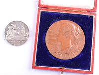 Lot 1 - Queen Victoria 1838 Coronation silver medal and Queen Victoria Diamond Jubilee 1897 bronze medal, cased (2).