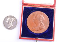 Lot 1a - Queen Victoria 1838 Coronation silver medal and Queen Victoria Diamond Jubilee 1897 bronze medal, cased (2).