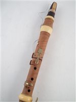 Lot 120 - Boxwood clarinet by Key London c.1850, with ivory fittings and brass keys, 59cm long
