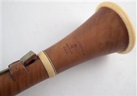 Lot 120 - Boxwood clarinet by Key London c.1850, with ivory fittings and brass keys, 59cm long