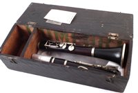 Lot 122 - Clarinet in Eb, Blackwood or Rosewood, simple system fitted with thirteen keys, with wood box early 20th century, 49cm long
