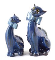 Lot 215 - Two C.H. Brannam Barum pottery cats