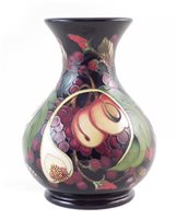 Lot 282 - A Moorcroft Queens Choice vase