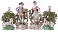 Lot 176 - A pair of Meissen style figures and a pair of Chelsea style sheep