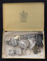 Lot 9 - A State Express Cigarettes tin containing collection of metal detecting finds to include silver buckle dating to the late 18th century, a snuffbox and other assorted silver items.