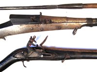Lot 136 - Indian Matchlock musket, a similar Flintlock and a throwing spear