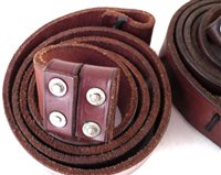 Lot 85 - Two Martini Henry leather slings, late pattern with rivets