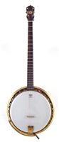 Lot 15 - John Grey and Sons Benares four string banjo