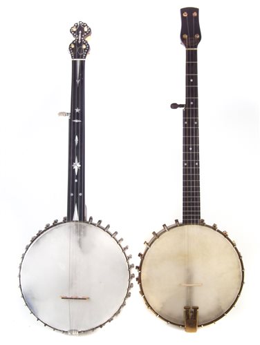 19 - Savana five string banjo and a fretless banjo