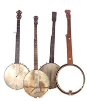 Lot 56 - Four five string banjos