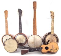 Lot 54 - Banjurine, Banjo mandolin, three Banjoleles and a Skylark ukulele