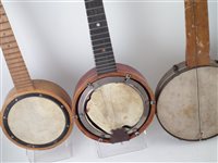 Lot 54 - Banjurine, Banjo mandolin, three Banjoleles and a Skylark ukulele