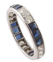 Lot 98 - Sapphire and diamond 18ct white gold eternity ring