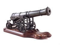 Lot 1 - 19th century bronze signal cannon with wood plinth