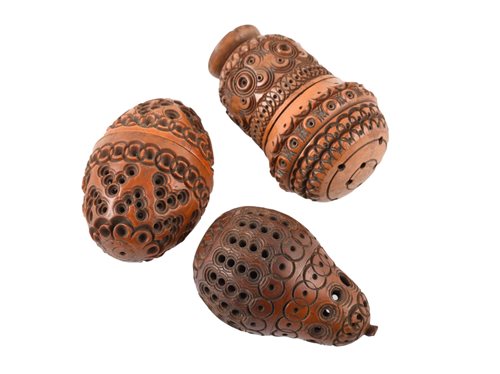 Lot 6 - Three pierced and carved coquilla nuts