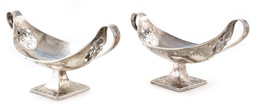 Lot 346 - Pair of Arts and Crafts silver boat shaped dishes by Albert Edward Jones
