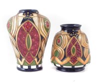 Lot 285 - Two Moorcroft vases decorated with Staffordshire gold