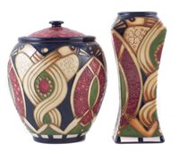 Lot 287 - Moorcroft lidded vase and one other decorated with Staffordshire gold pattern