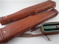 Lot 32 - Two leg of mutton gun cases and a cartridge case