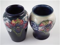Lot 286 - Two Moorcroft orchid pattern vases, the tallest stands 15cm high