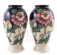 Lot 302 - A pair of Moorcroft vases
