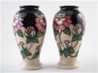 Lot 302 - A pair of Moorcroft vases