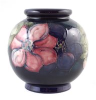 Lot 284 - Moorcroft clematis pattern vase, 15cm high