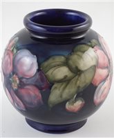 Lot 284 - Moorcroft clematis pattern vase, 15cm high