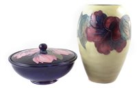 Lot 283 - Moorcroft vase and lidded bowl.