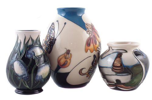 Lot 294 - Three small Moorcroft vases