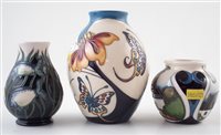 Lot 294 - Three small Moorcroft vases