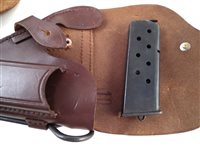 Lot 42 - Browning semi-automatic pistol holster with magazine and one other holster