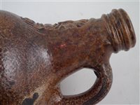 Lot 185 - German stoneware Bellarmine jug